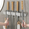Versatile wall support for household tools