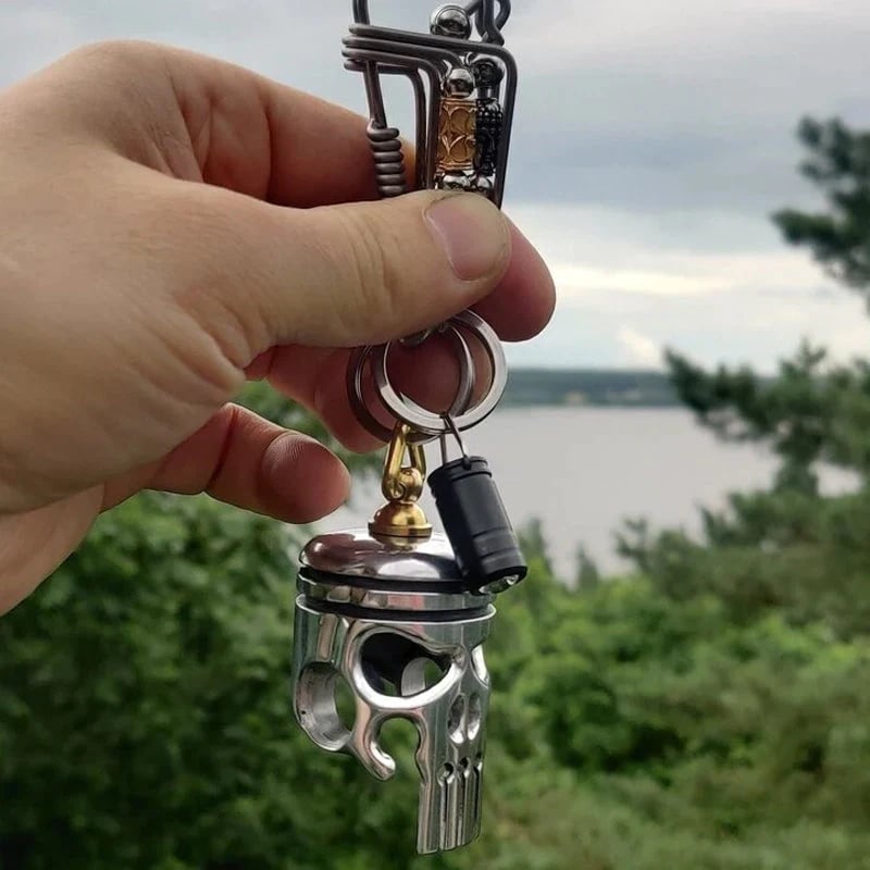 GrimTorque™ - Piston Skull Keychain